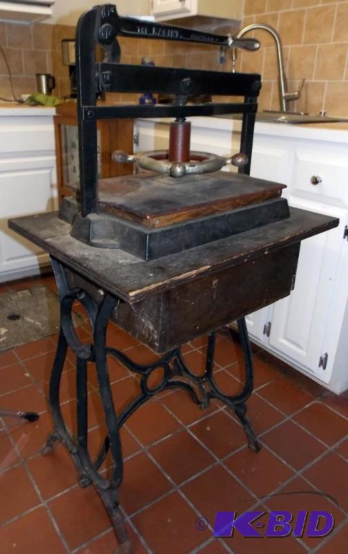 Lot 479 - Book press. A cast iron book press/copy