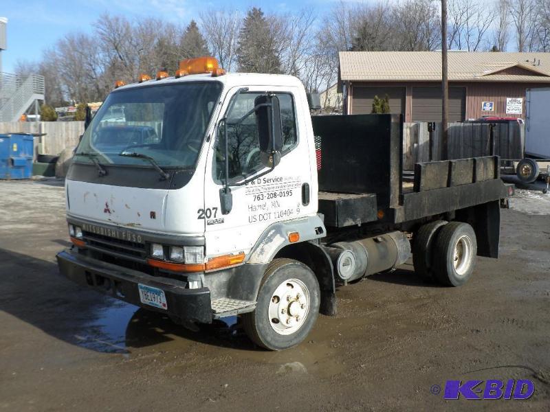 lot 1 image: 1999 Mitsubishi FH Utility Truck, Single Axle...