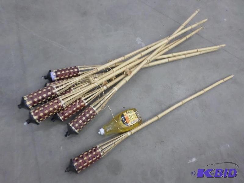 lot 55 image: (8) Tiki Torches With Jug Of Torch Fuel...