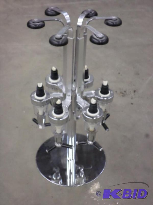 lot 78 image: 6-Place Rotating Liquor Bottle Dispenser...