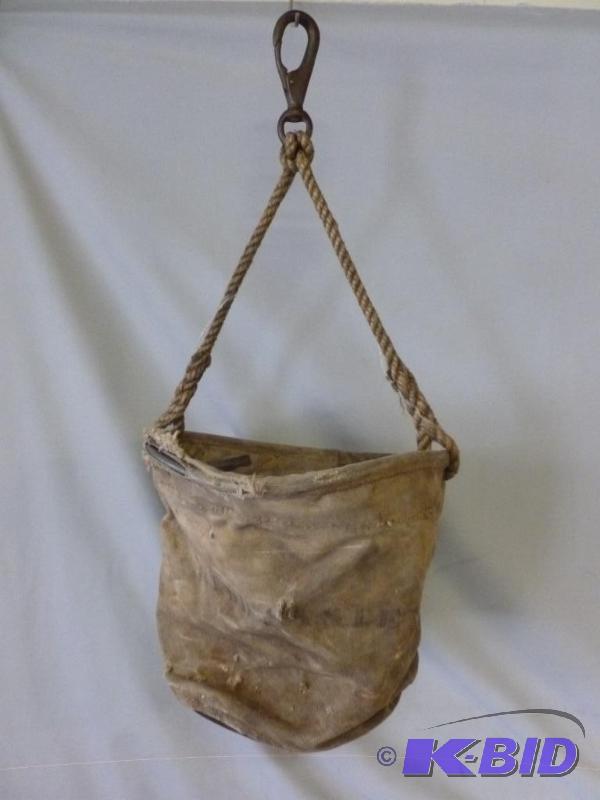 lot 113 image: Vintage Foster Co. canvas water bucket with r...