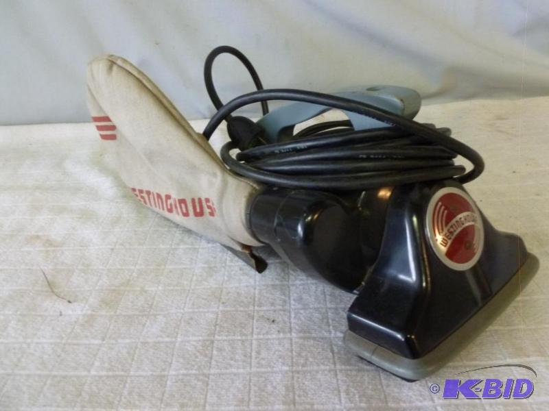 lot 115 image: Westinghouse electric hand vacuum, tested and...