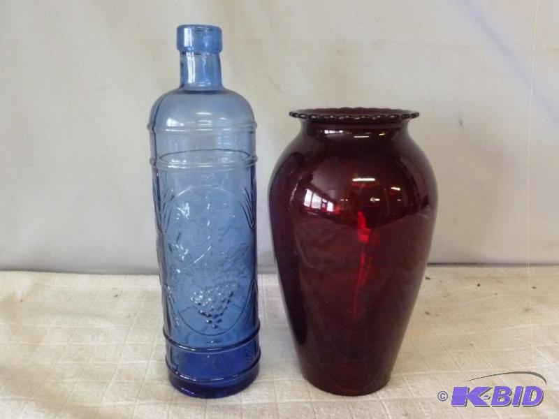 lot 129 image: This lot consists of a ruby red glass vase th...