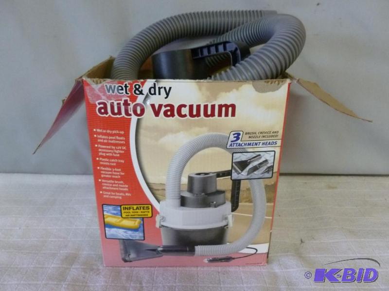 lot 14 image: Wet & dry 12v. auto vacuum, comes in the ...