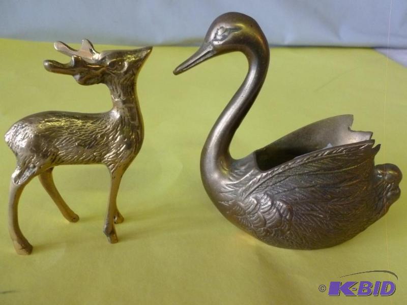 lot 140 image: Lot of two case brass figurines that includes...