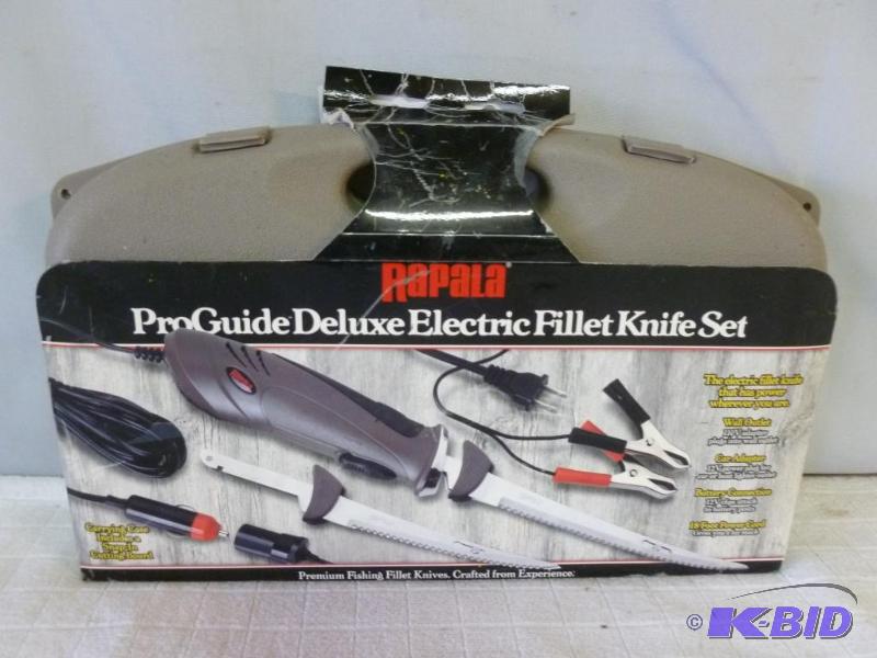 lot 15 image: Rapala pro guide deluxe electric fillet knife...