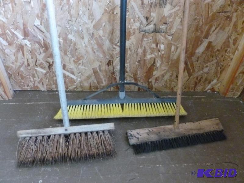 lot 58 image: Lot of three brooms that includes a good push...