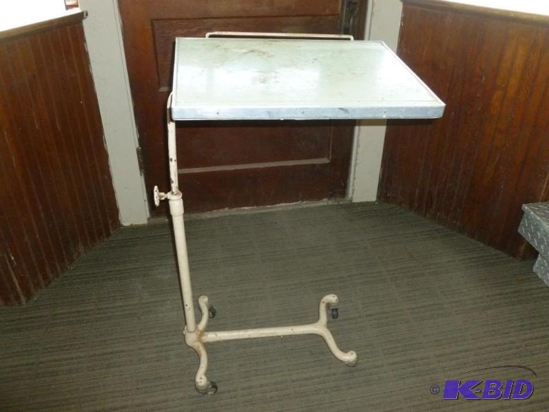 lot 63 image: Vintage roller wheel dentist instrument cart....