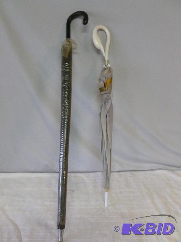 lot 76 image: Lot of two vintage umbrellas including one t...