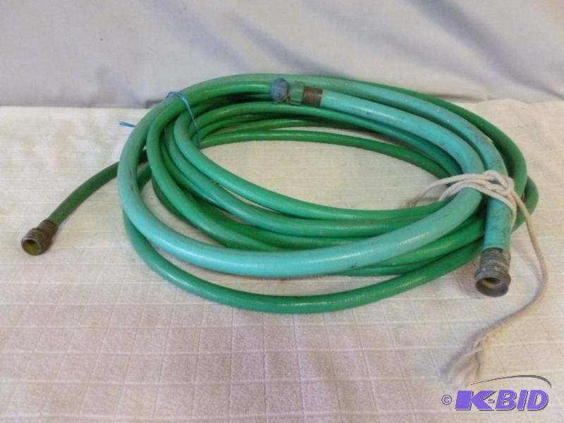 lot 87 image: Length of garden hose, looks like about 25 fe...