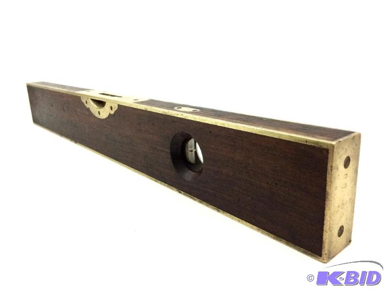 lot 1 image: Antique  Rose Wood & Brass Level. Nr 1 O.G. Tratton Bros. Greenfield, Mass. Patented July 15, 1872