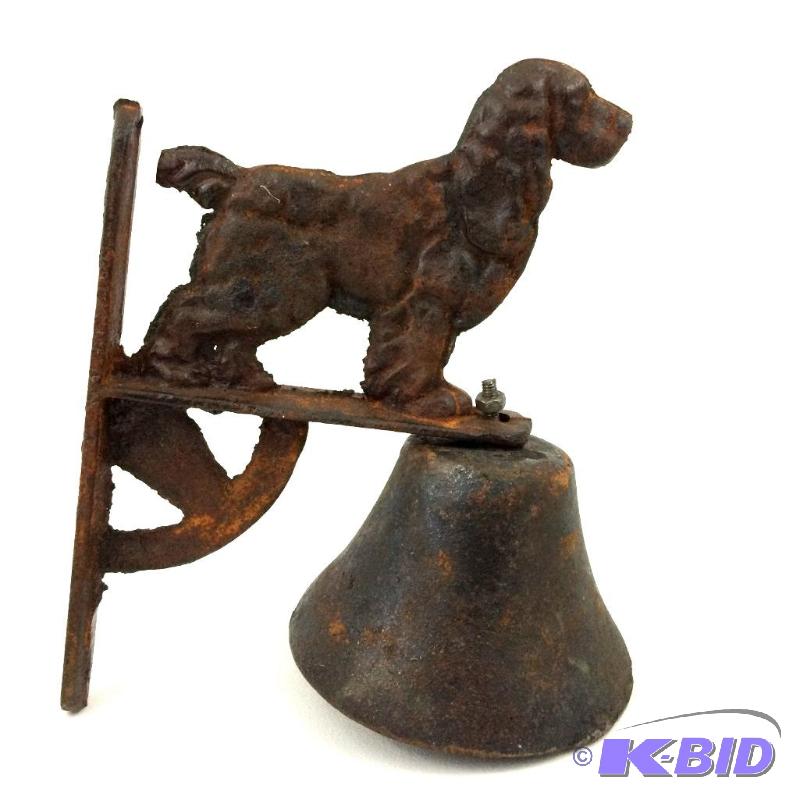 lot 4 image: Cast Iron Bell on a bracket decorated with a spaniel