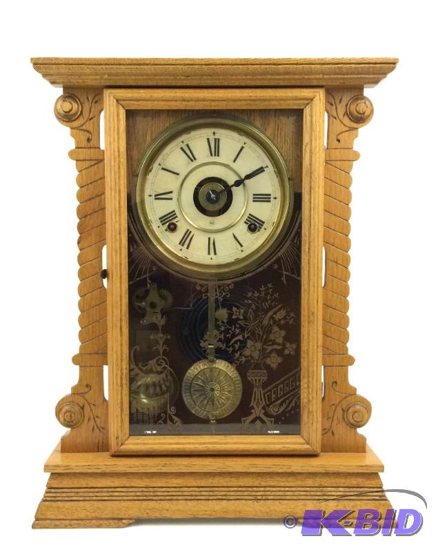 lot 9 image: Seth Thomas Clock with Winding Key. Clock Stands 17 12 Tall Original Dial & Gilt Glass Door