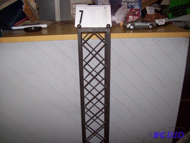 Bronze metal Wine Rack, holds 8 Bottles, Matc...