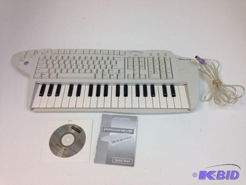 lot 14 image: Creative Prodikeys DM PS2 Computer & Mus...