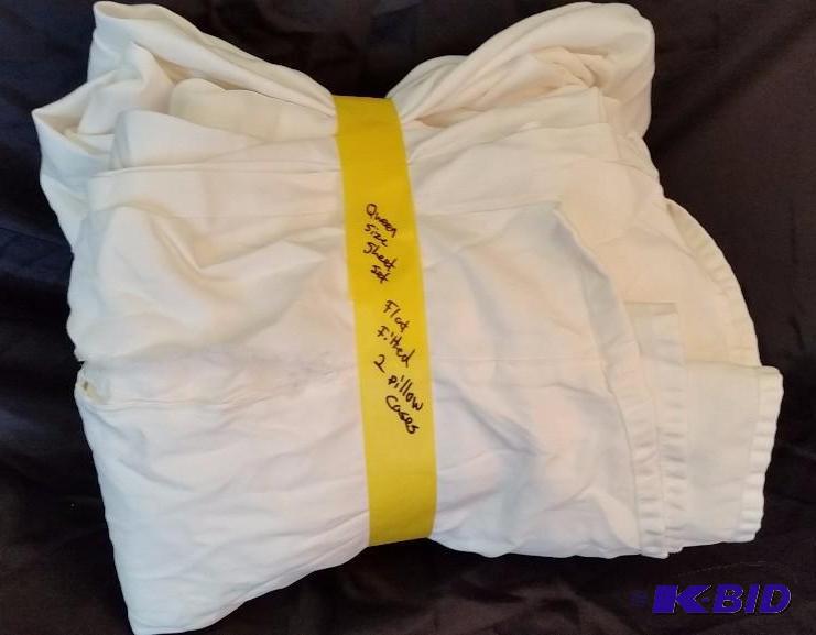 Out of Package. Cream Customer Return Complete Queen Sheet set.  Tear along the seam.  Repairable