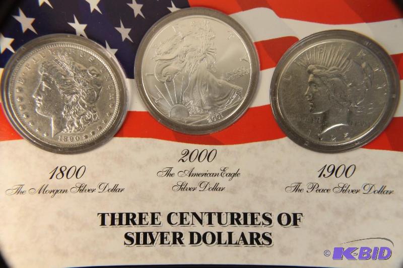 THREE CENTURIES OF SILVER DOLLARS 1890 MORGAN 1925 PEACE & 2001 US SILVER EAGLE COINS
