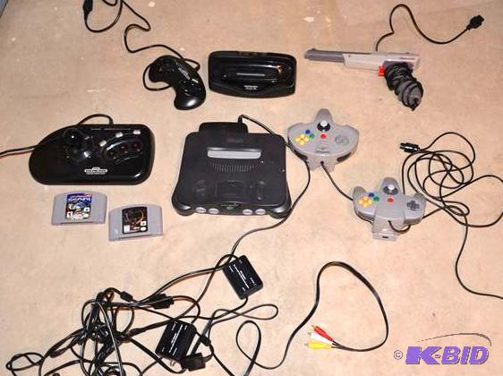 lot 136 image: Nintendo 64, Sega Genesis & controllers, ...