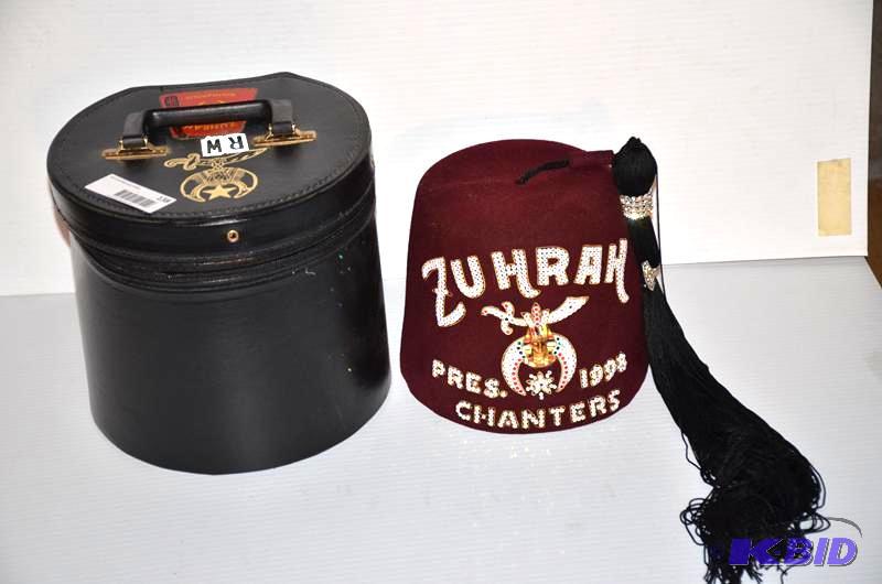 lot 138 image: Zuhrah Shriners fez hat with tassels Presiden...