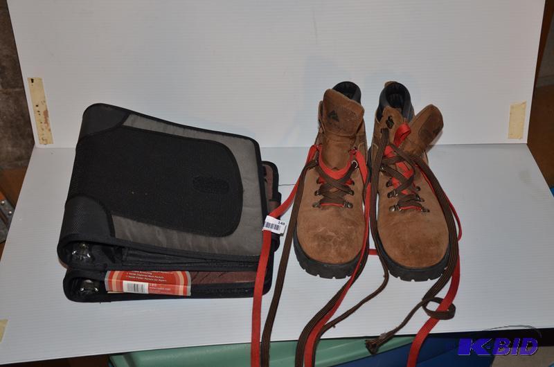 lot 148 image: Ozark Trail boots size 13 & 2 folders...