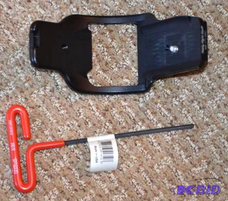 lot 15 image: Nikon F5 camera L Bracket with wrench. This i...