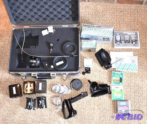 lot 17 image: Mamiya camera accessories - lens, hood, filte...