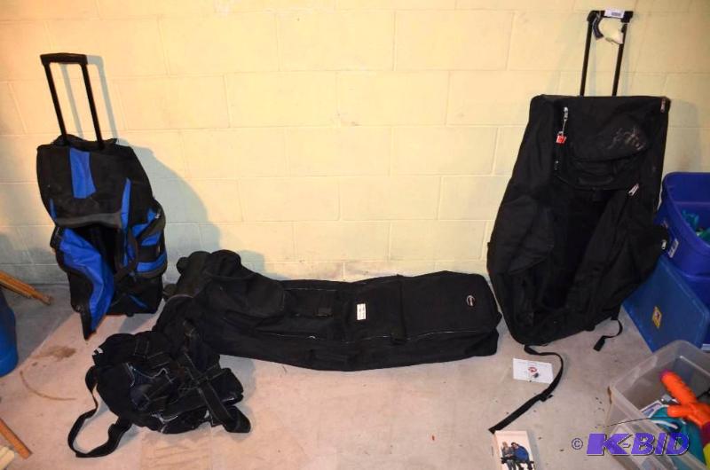 lot 212 image: Wheeled travel bags, Columbia, Burton, Jeep...