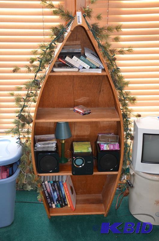 lot 38 image: Boat book shelf - 56x24x12x". Contents a...