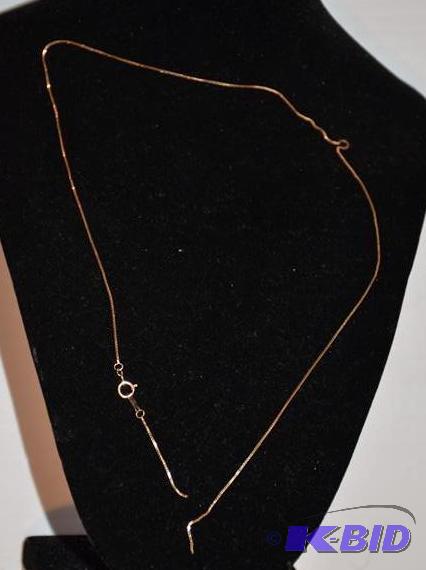 lot 45 image: 10K gold necklace, broken...
