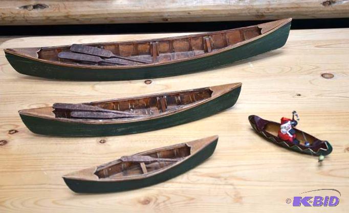 lot 61 image: 4 Canoes - the largest is 15" long...
