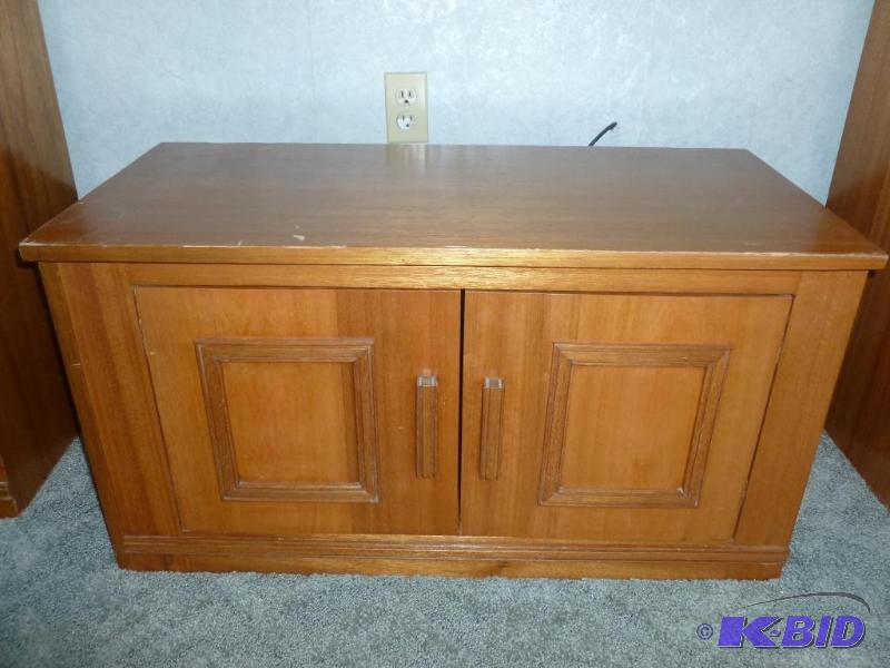 lot 25 image: Beautiful custom made mahogany t.v cabinet st...
