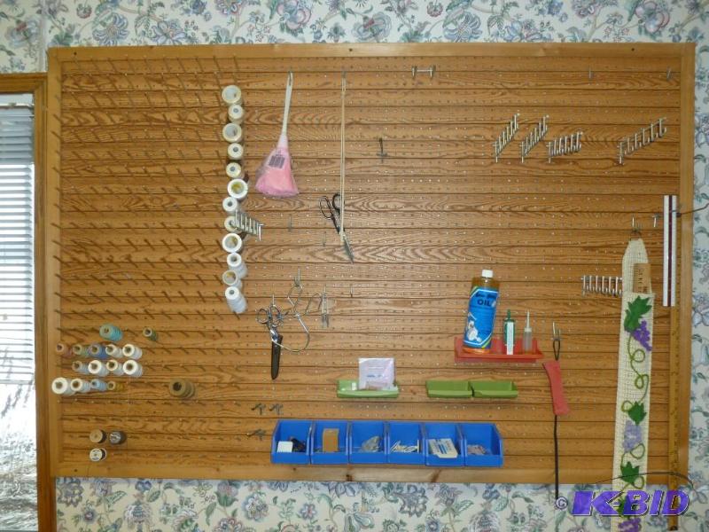 lot 38 image: Large wooden peg board style sewing room rack...