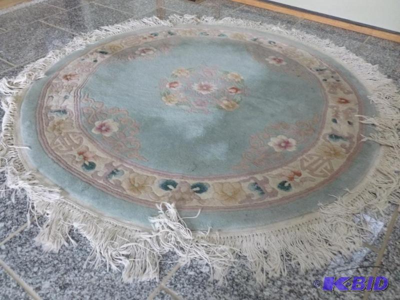 lot 55 image: Beautiful hand made entry rug that measures a...