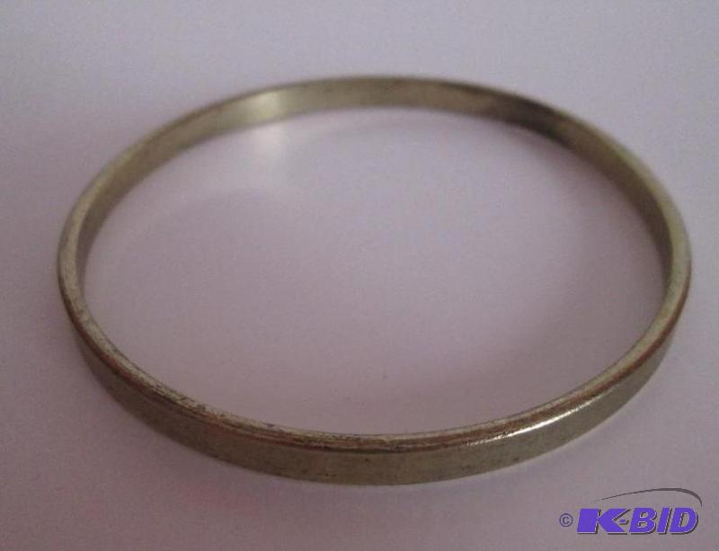 lot 121 image: Gold colored metal braclet...