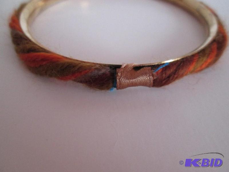 lot 122 image: metal framed fall colored string braclet...
