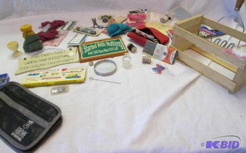 lot 44 image: lot of assorted sewing supplies and wall dcor...
