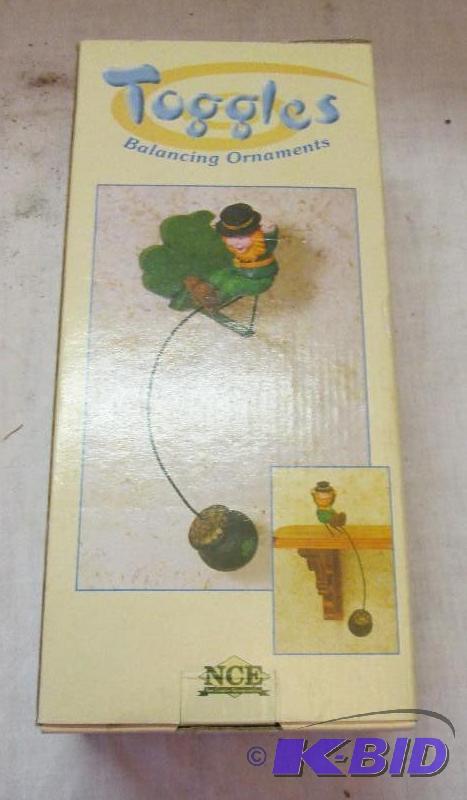 lot 61 image: Toggles balancing ornaments...