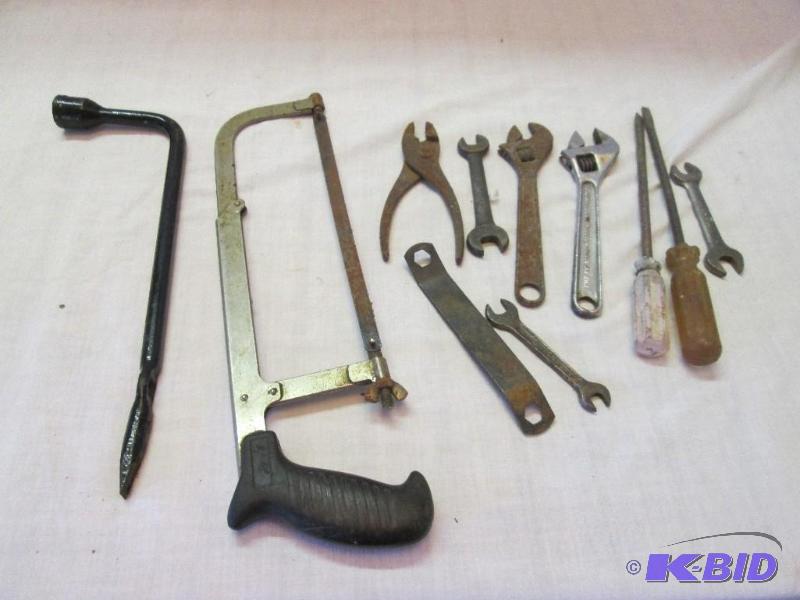 lot 98 image: lot of tools -wrenches, saw, crowbar, and scr...