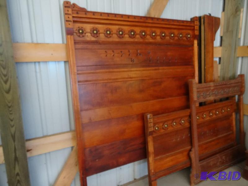Antique wood head board and foot board. Unkno...
