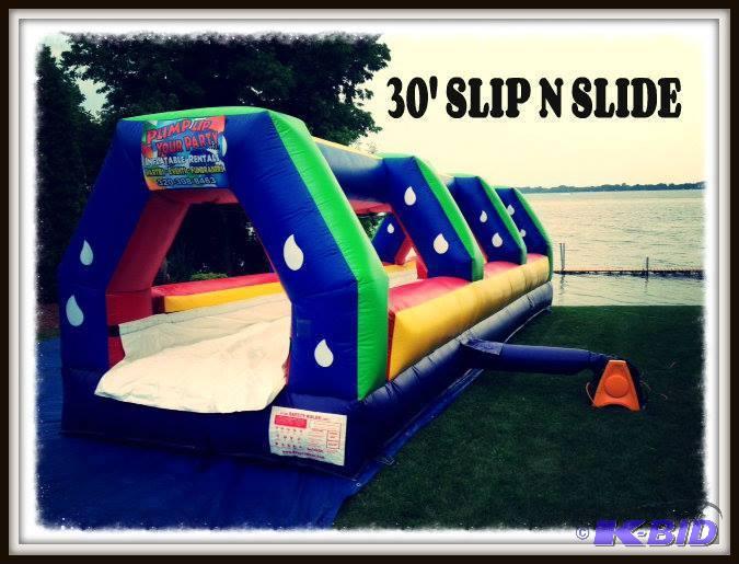 lot 12 image: 30 Slip N Slide Commercial Inflatable