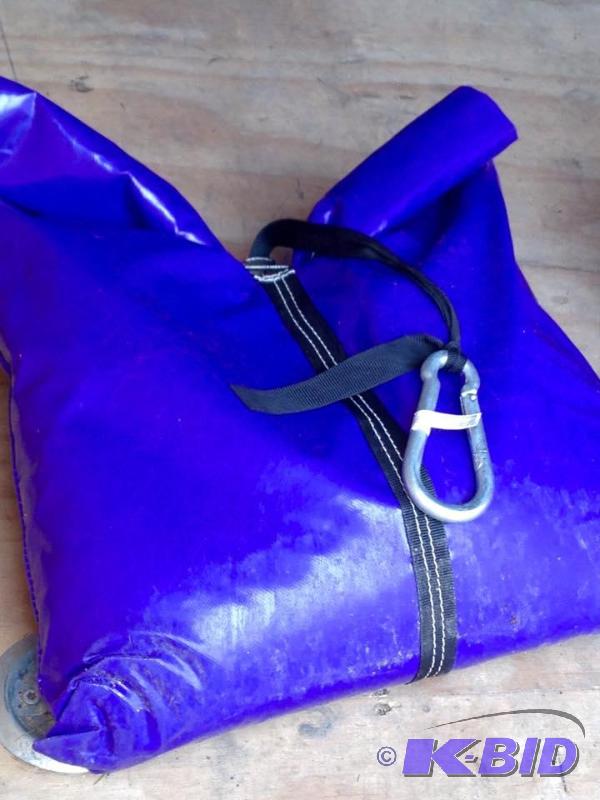 lot 55 image: Lot of 4 Blue Sandbag Covers with Clips