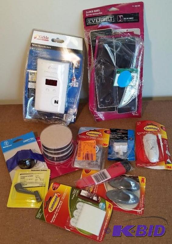 lot 30 image: 11 Item Lot Furniture Sliders,Carbon Monoxide Alarm,Command Strips,  Utility Knife.