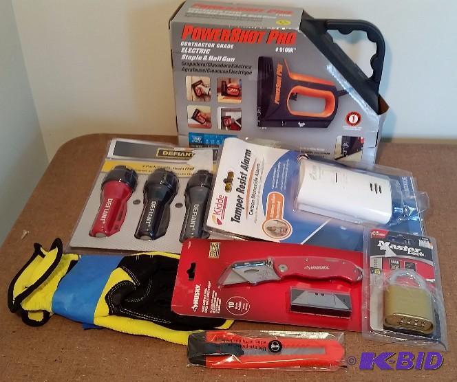 lot 8 image: 7 item Lot Electric Stapler, CO Detector, Flashlights, Gloves, utility Knives, Locks and Keys