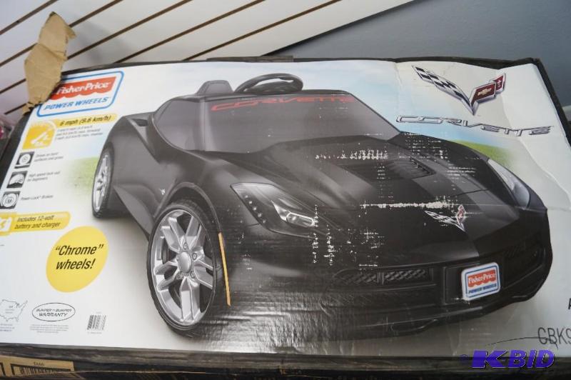 lot 23 image: Black Corvette
