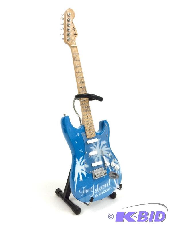 lot 28 image: Miniature guitar with included stand