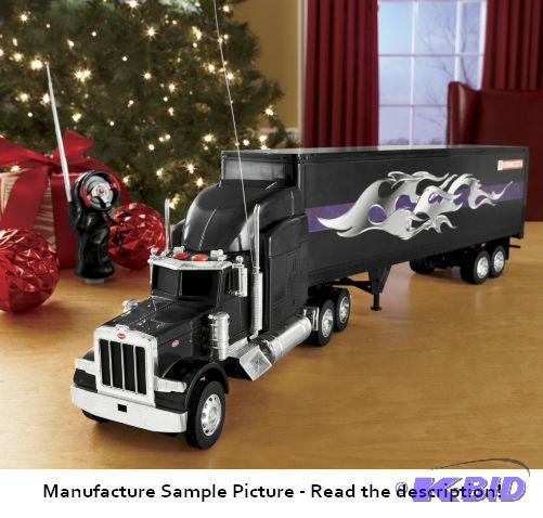 lot 15 image: Remote Control Peterbilt Semi with Trailer - ...