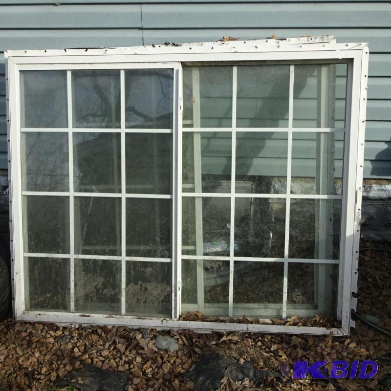 Vinyl window. Slider with grids. 59 x 48...