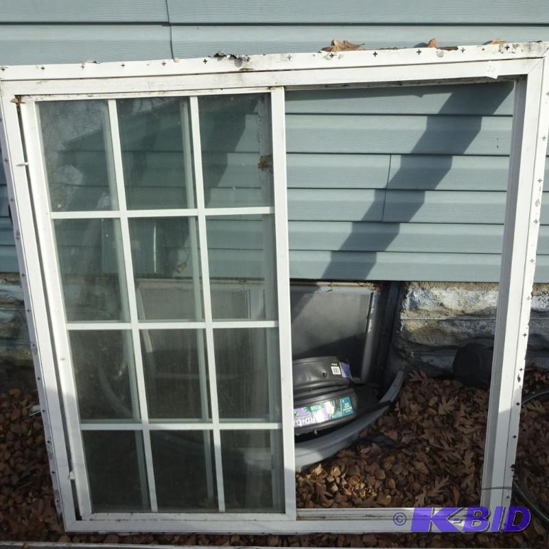 Vinyl window. Slider with grids. 48 x 48...