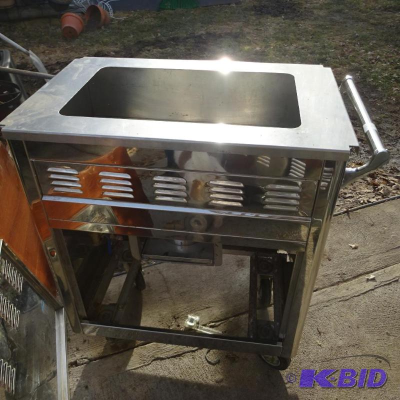 Stainless food cart. Holds 1 large prep pan. ...