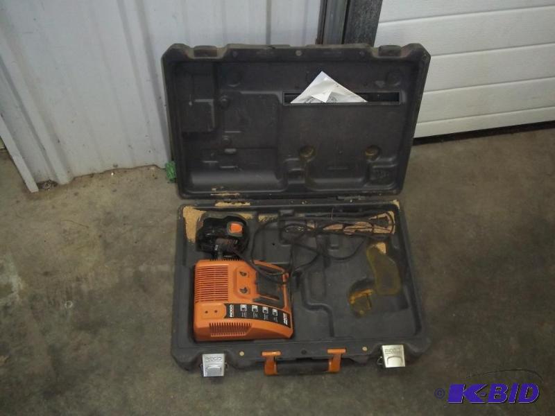 Ridgid battery charger, battery and tool case...